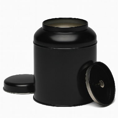 Récipient noir cylindrique avec un couvercle ouvert et un trou sur le côté.